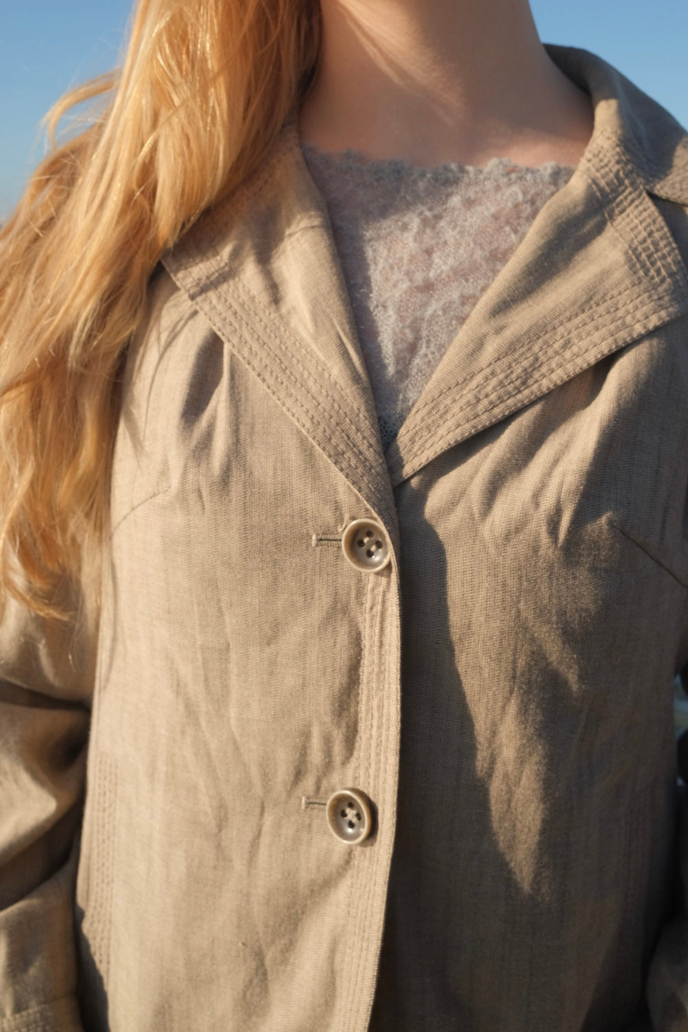 Grey blazer with pleat details