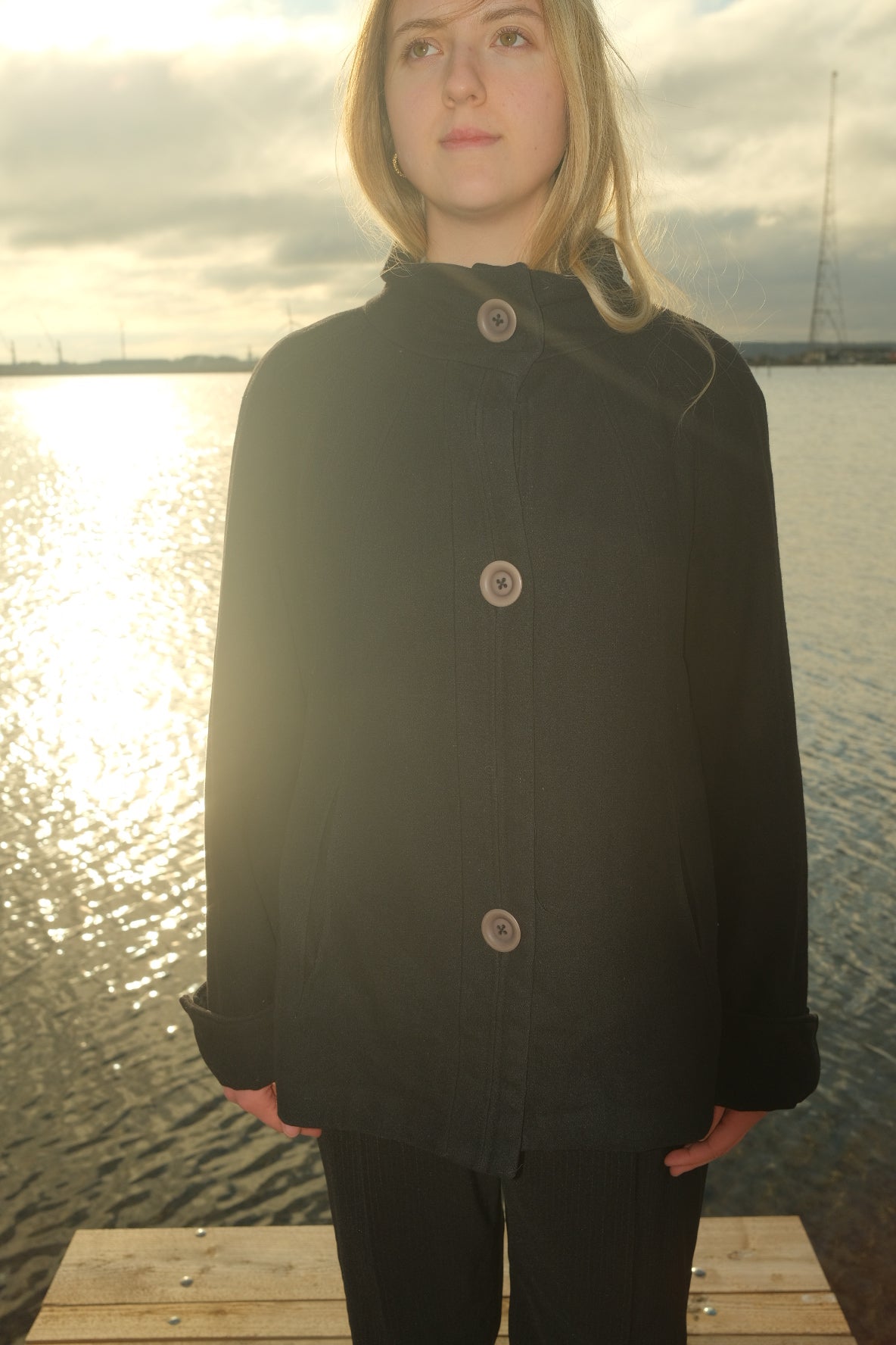 Black short wool coat with large buttons