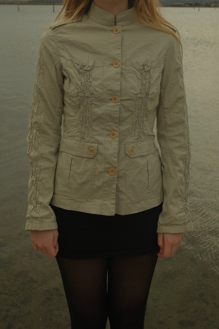 Cream blazer with ruched details
