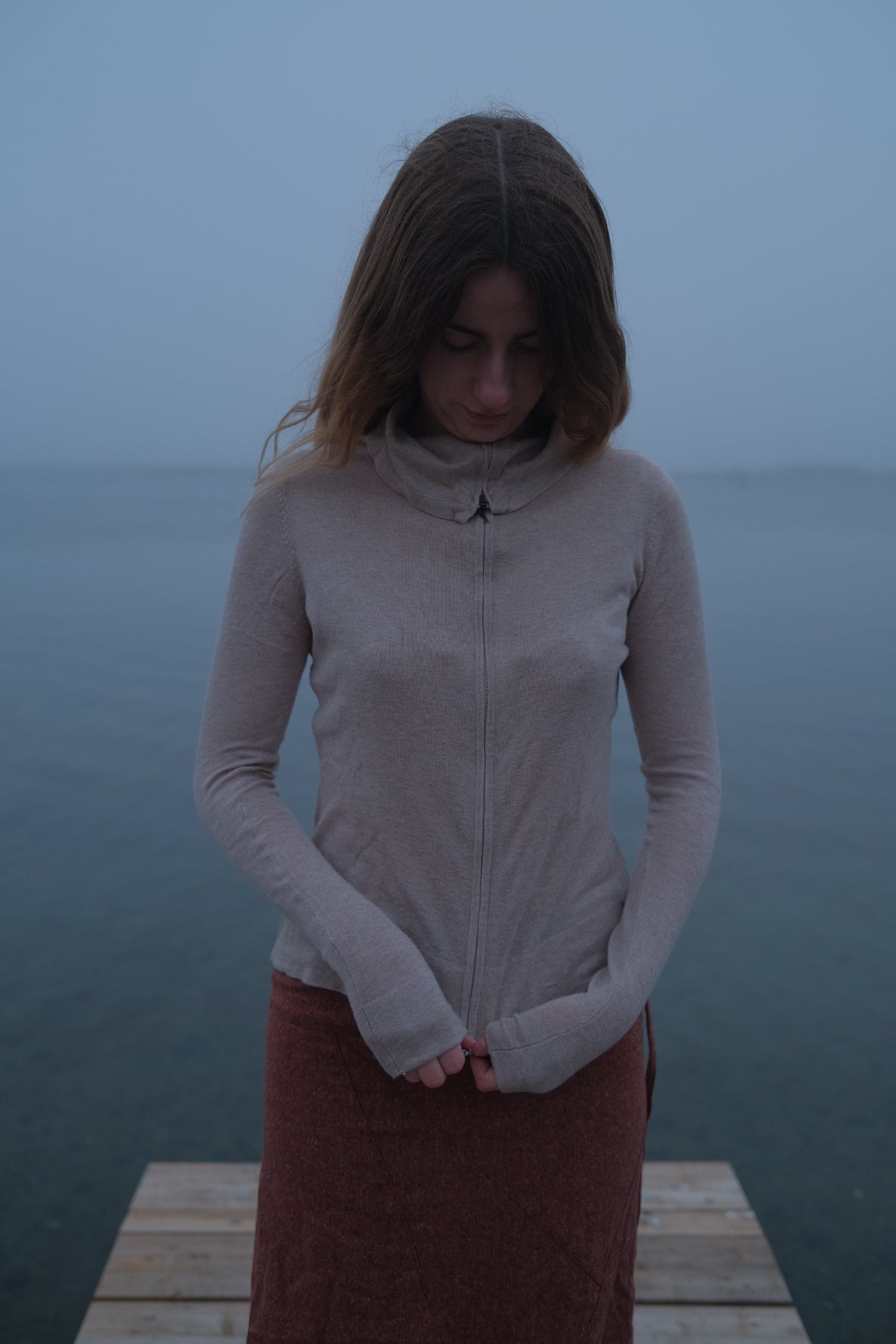 Cream-colored wool and silk knit sweater