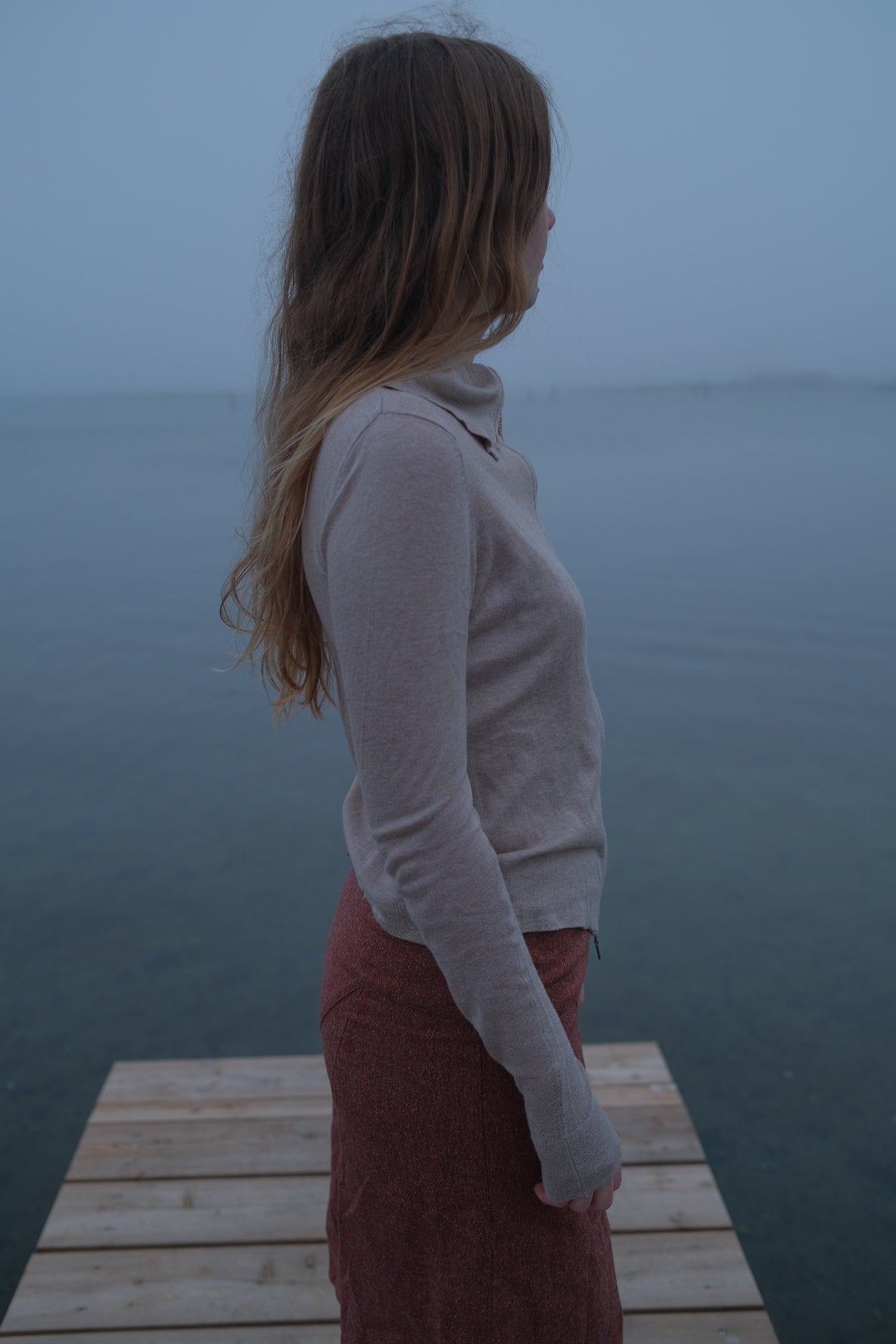 Cream-colored wool and silk knit sweater