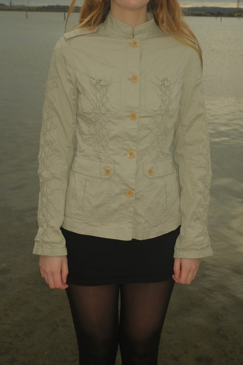 Cream blazer with ruched details