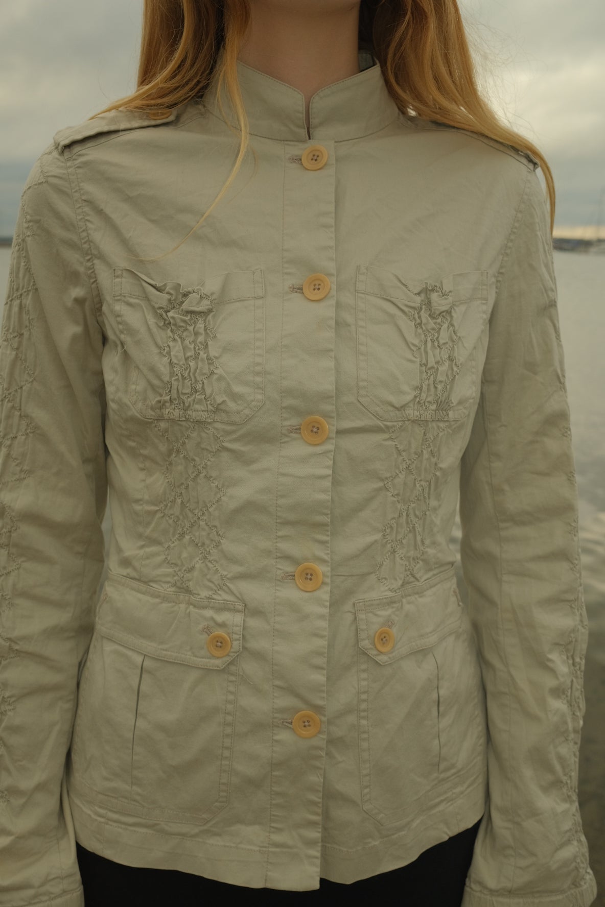 Cream blazer with ruched details