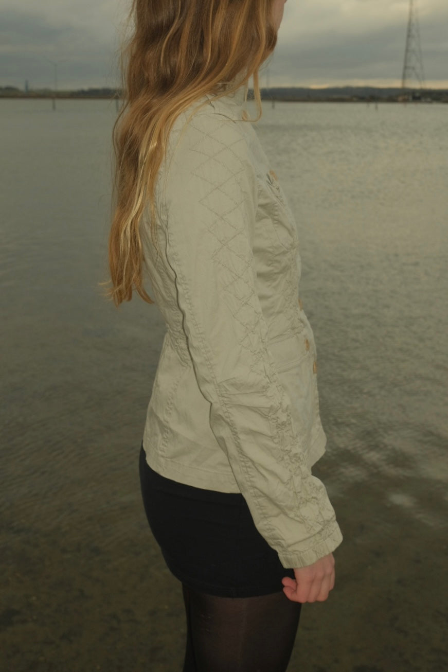 Cream blazer with ruched details