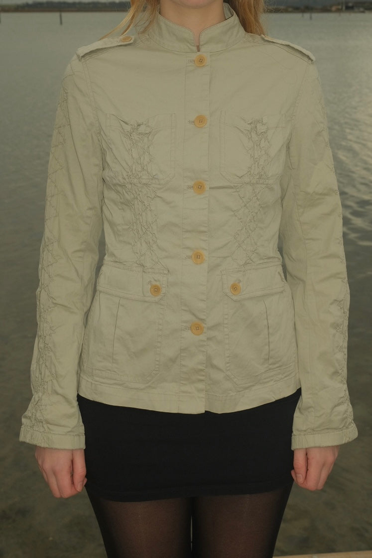 Cream blazer with ruched details
