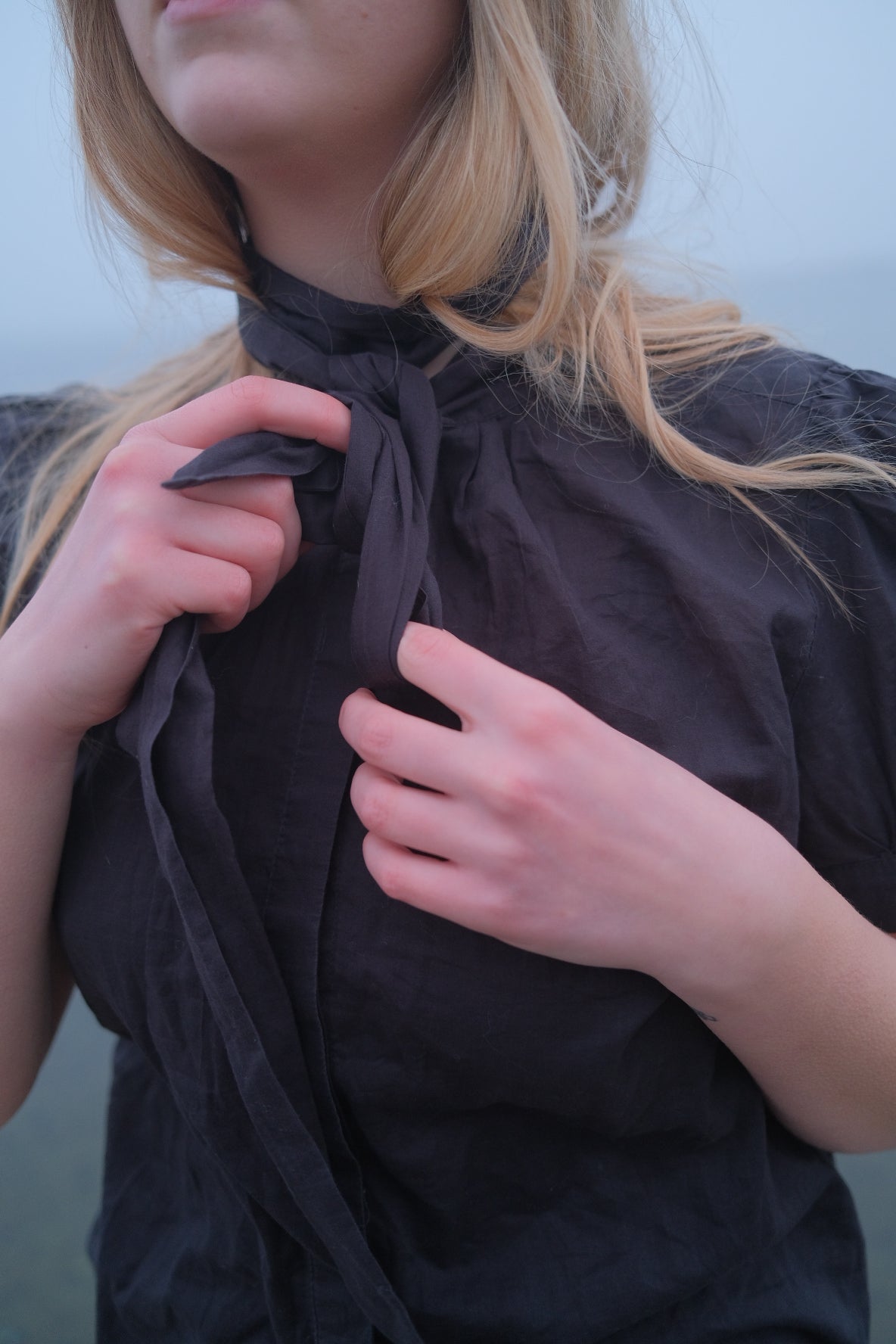 Black shirt with ribbon