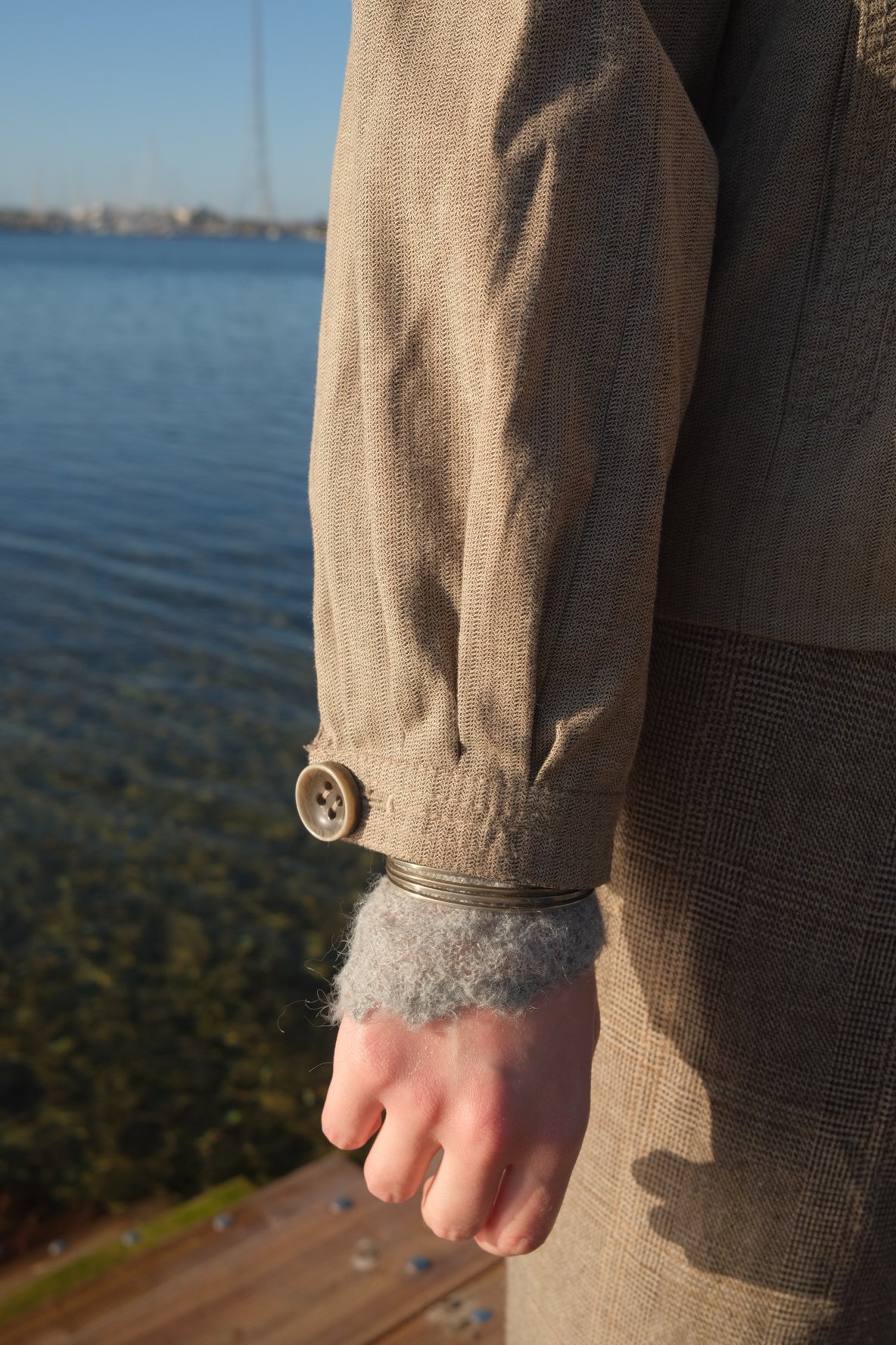 Grey blazer with pleat details
