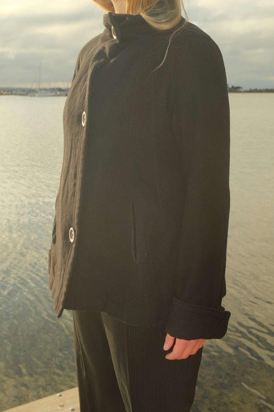 Black short wool coat with large buttons