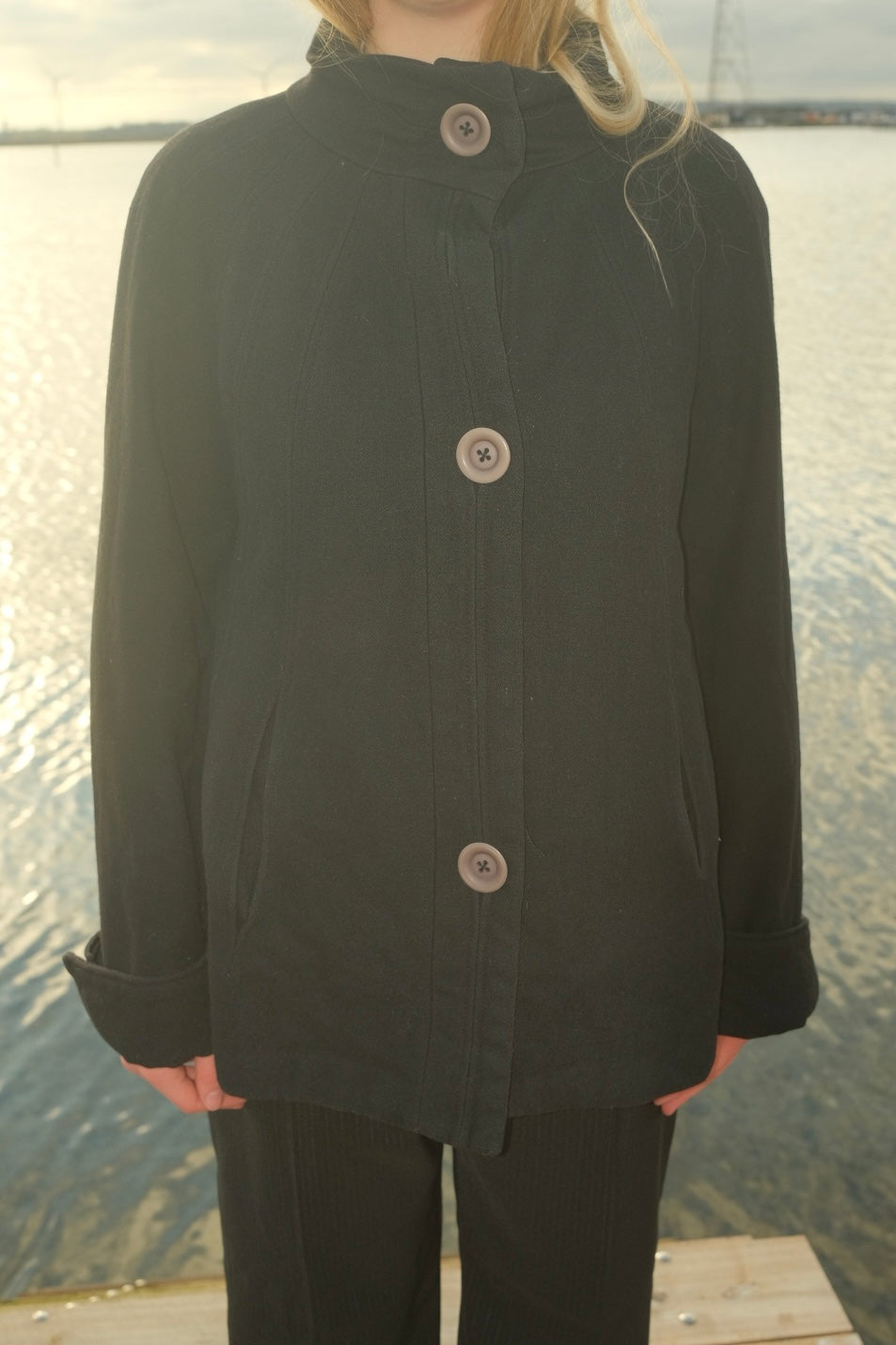 Black short wool coat with large buttons